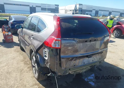 2016 Honda Cr-V Touring z USA, uszkodzony, nr VIN 5J6RM3H92GL031415